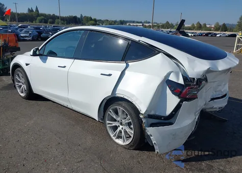 2023 Tesla Model Y Awd/Long Range Dual Motor All-Wheel Drive z USA, uszkodzony, nr VIN 7SAYGDEE5PF755573